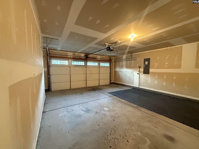 garage featuring electric panel and a garage door opener