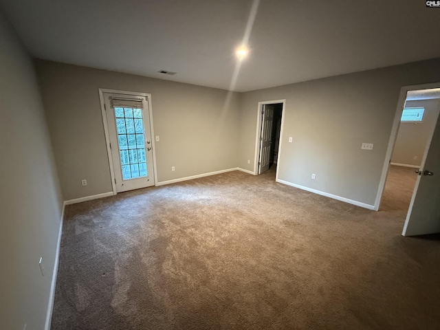 view of carpeted spare room