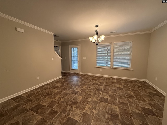 spare room with crown molding and an inviting chandelier