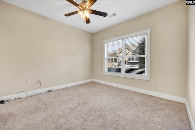 carpeted empty room with ceiling fan