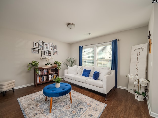 living room with dark hardwood / wood-style floors