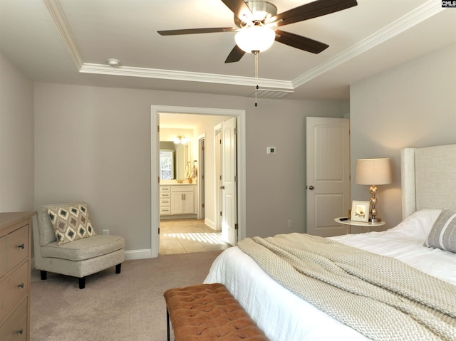 bedroom featuring crown molding, a raised ceiling, light colored carpet, ceiling fan, and baseboards