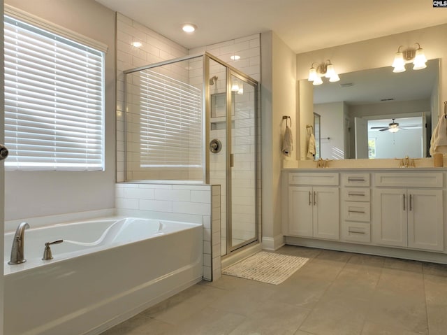 bathroom with tile patterned flooring, vanity, separate shower and tub, and ceiling fan