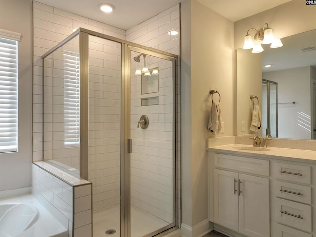 bathroom with vanity and an enclosed shower