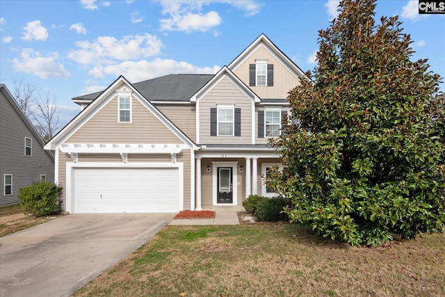 front of property featuring a garage and a front yard