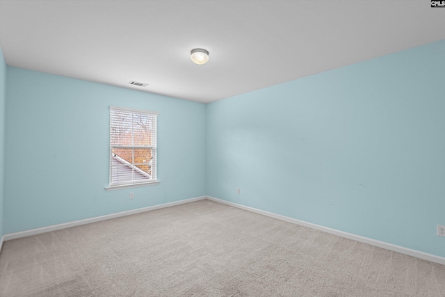 empty room featuring carpet floors