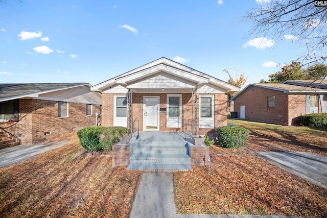 single story home with covered porch