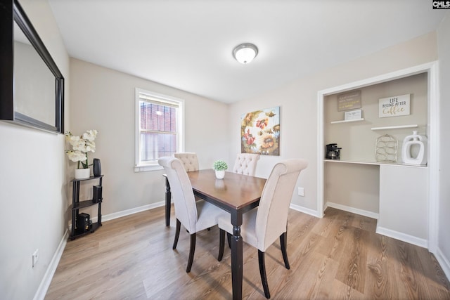 dining room featuring light hardwood / wood-style flooring