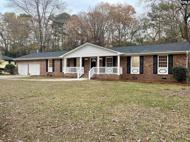 view of front facade with a porch, a garage, and a front yard