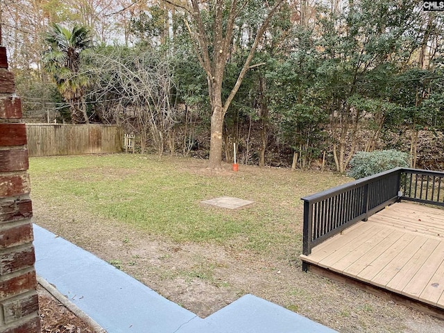 view of yard with a wooden deck