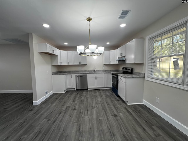 kitchen with stainless steel appliances, sink, pendant lighting, dark hardwood / wood-style floors, and white cabinetry