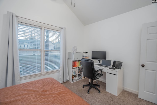 office featuring light colored carpet and lofted ceiling