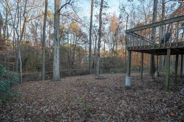 view of yard featuring a wooden deck