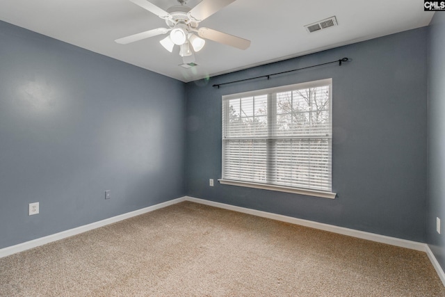 unfurnished room with carpet floors and ceiling fan