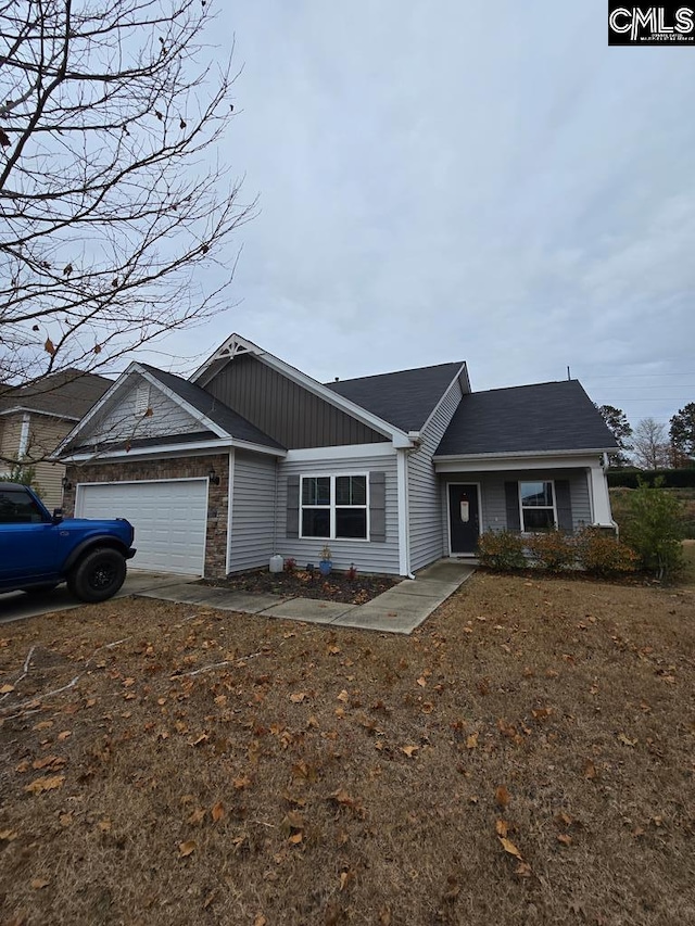 view of front of property featuring a garage