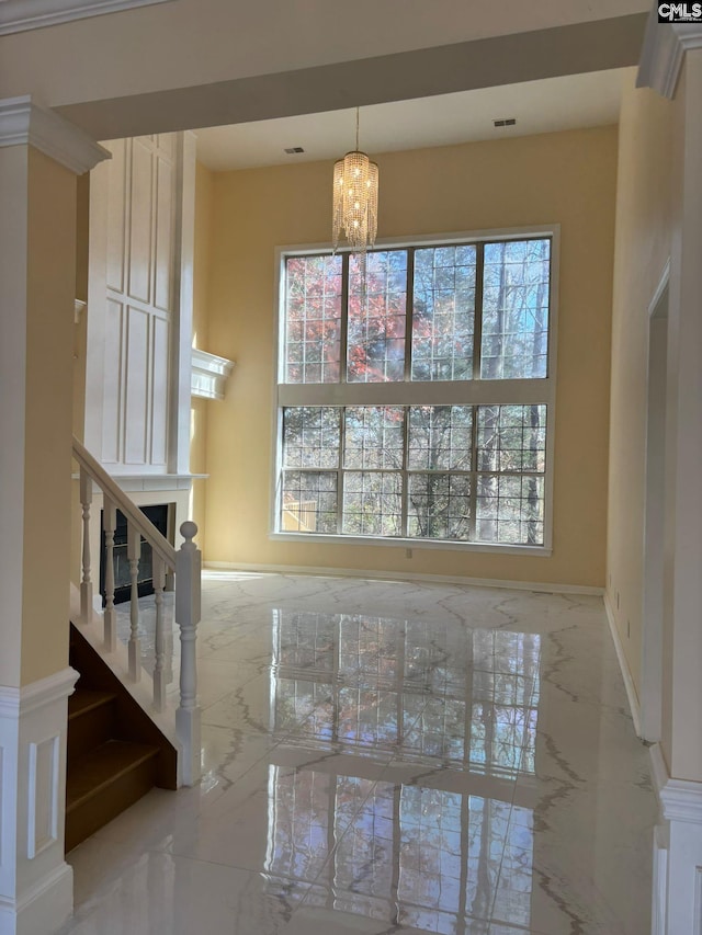 unfurnished dining area featuring an inviting chandelier