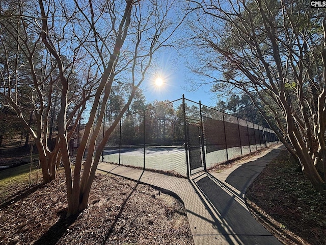 view of basketball court with tennis court