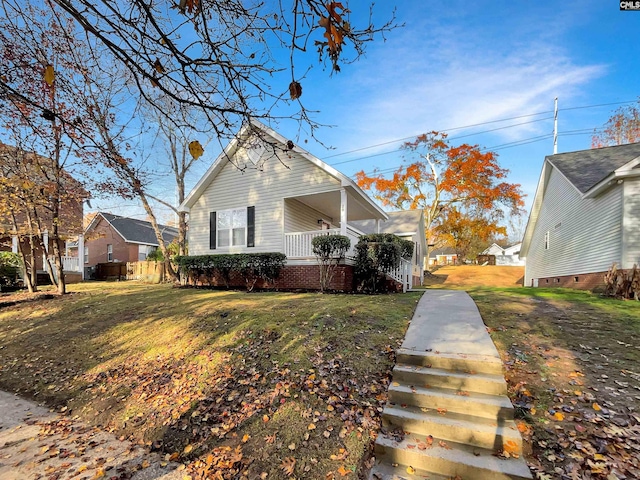 view of property exterior featuring a lawn