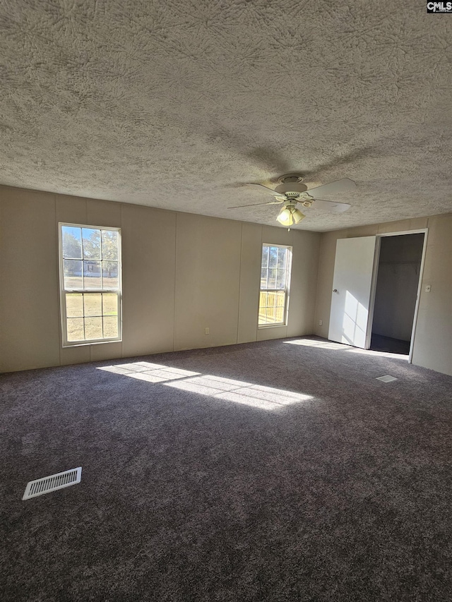 1611 Carolina Ln, Beaufort, SC 29906 - carpeted spare room featuring ceiling fan and a wealth of natural light