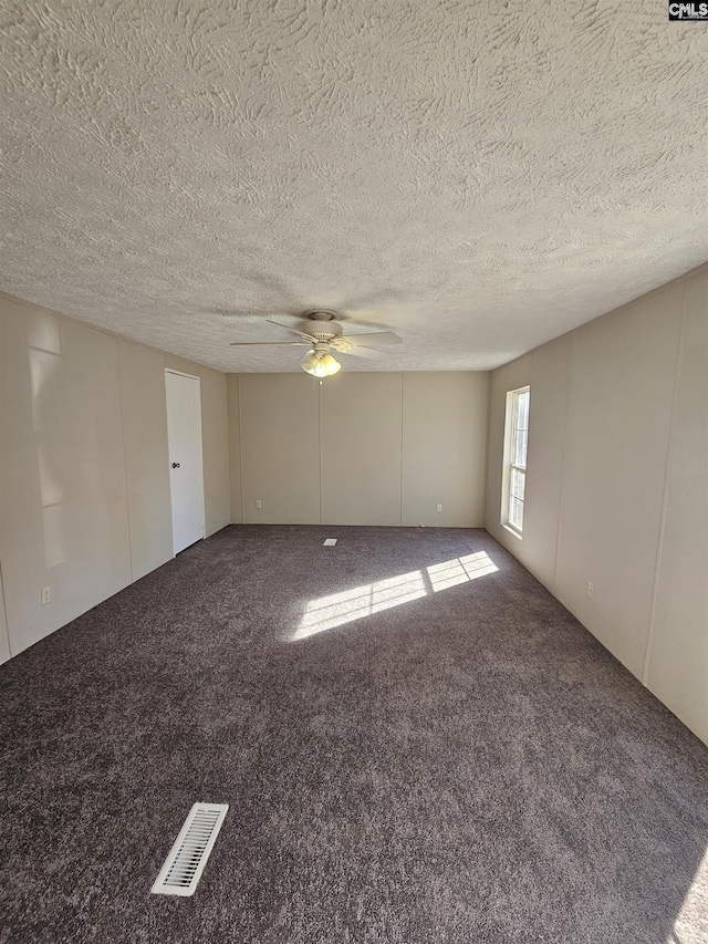 1611 Carolina Ln, Beaufort, SC 29906 - carpeted spare room featuring ceiling fan and a textured ceiling