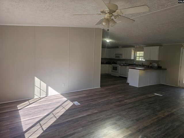 1611 Carolina Ln, Beaufort, SC 29906 - kitchen featuring white cabinets, white range oven, ceiling fan, dark hardwood / wood-style flooring, and kitchen peninsula