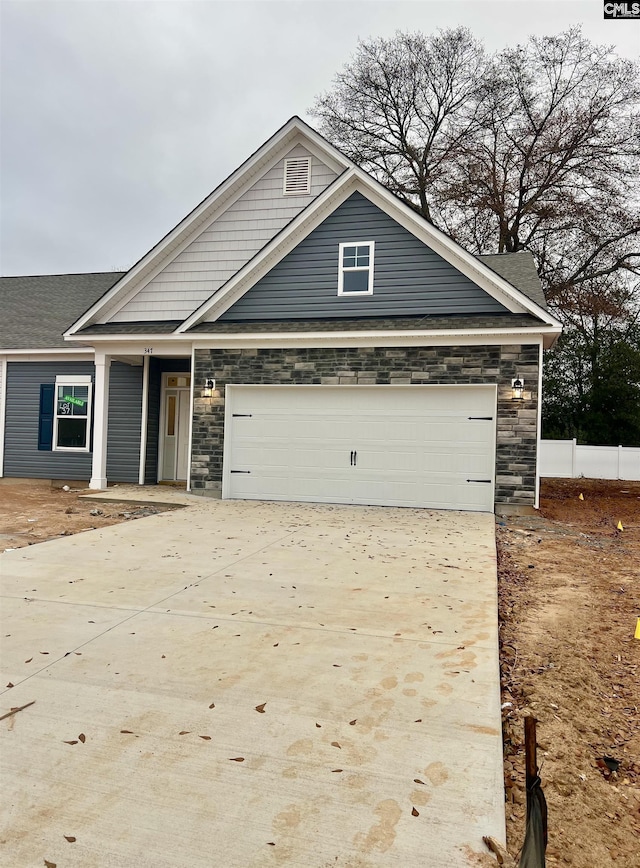 craftsman-style house with a garage