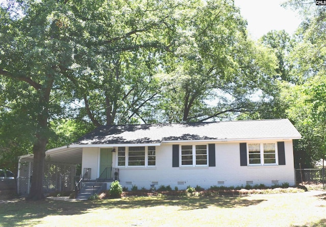 single story home with a carport