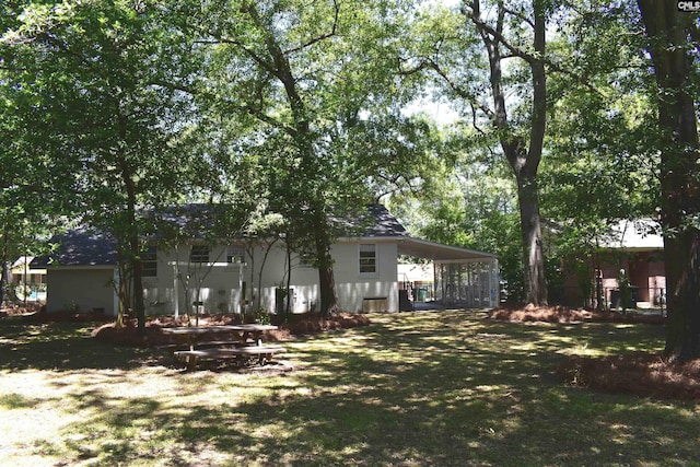 view of yard featuring a carport