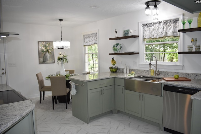 kitchen featuring dishwasher, pendant lighting, a healthy amount of sunlight, and sink