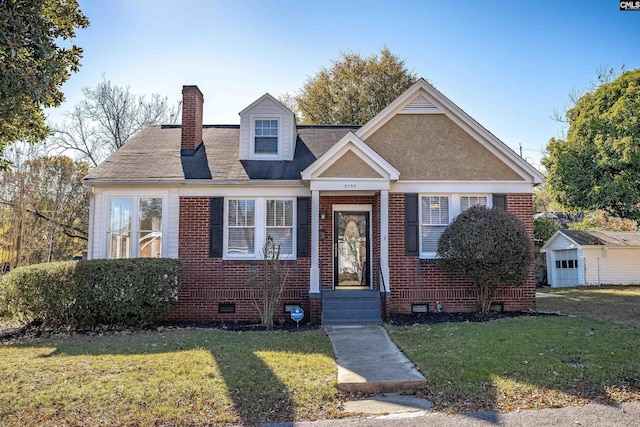 view of front of home with a front yard