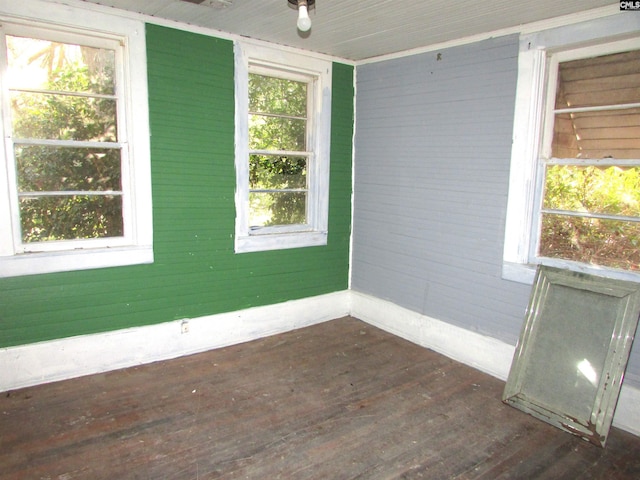 unfurnished sunroom featuring a healthy amount of sunlight