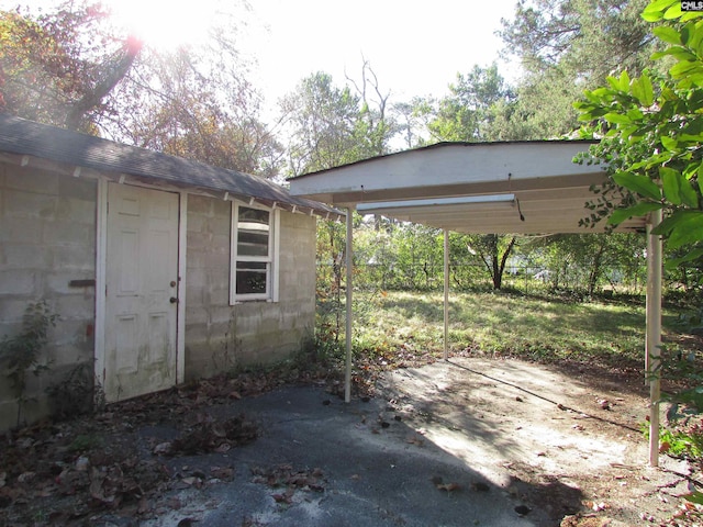 view of patio featuring a carport