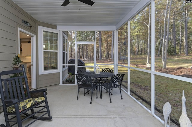 sunroom / solarium with ceiling fan