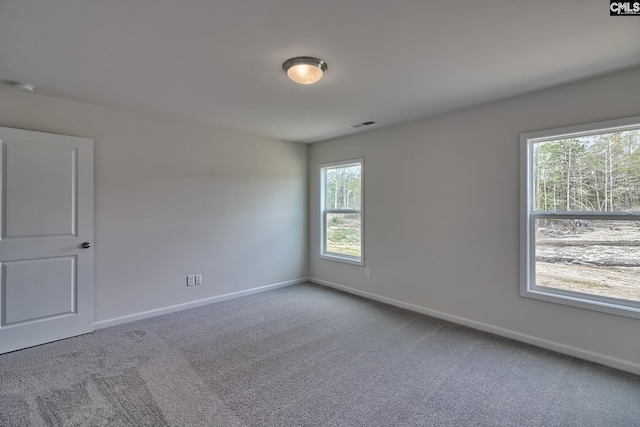 view of carpeted spare room