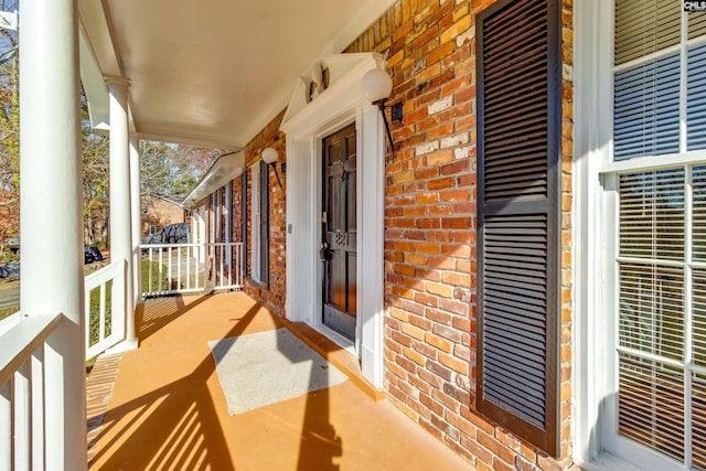 balcony featuring a porch