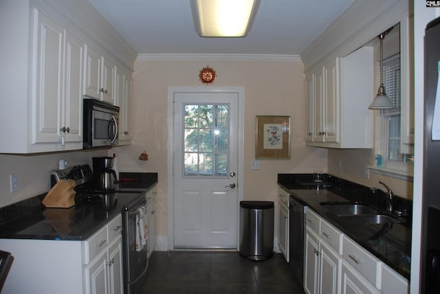 kitchen with white cabinetry, sink, black appliances, and ornamental molding