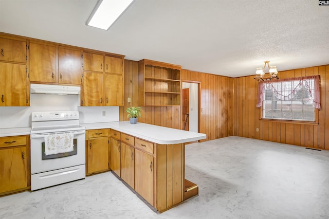 kitchen featuring kitchen peninsula, white electric range oven, a textured ceiling, a chandelier, and wood walls