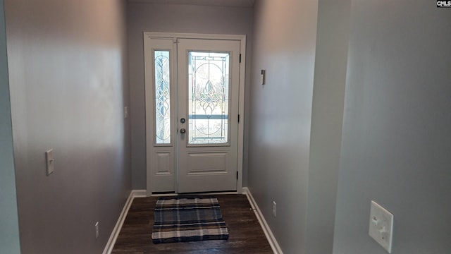 doorway with dark hardwood / wood-style floors