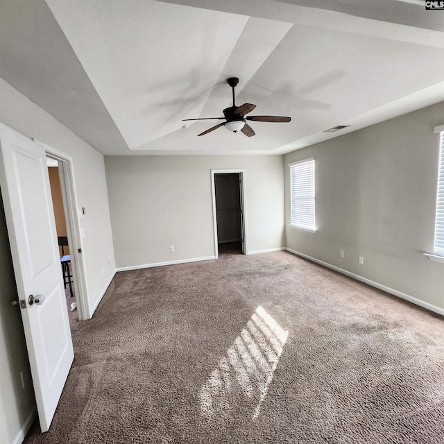 spare room with carpet flooring and ceiling fan