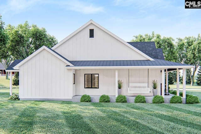 view of front of house with a porch and a front yard