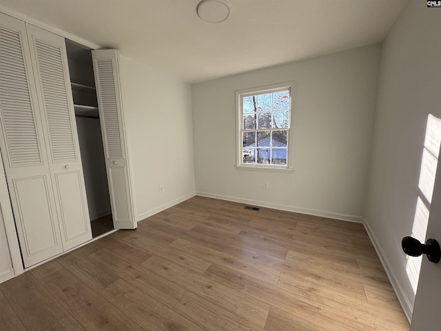 unfurnished bedroom featuring light hardwood / wood-style floors