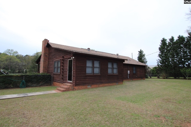 exterior space featuring a lawn