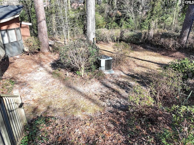 view of yard featuring central AC