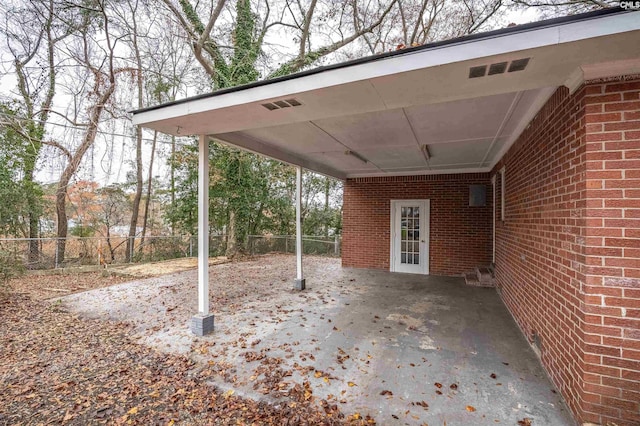 view of patio / terrace with a carport