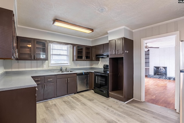 kitchen featuring dark brown cabinetry, dishwasher, sink, black electric range oven, and light wood-type flooring