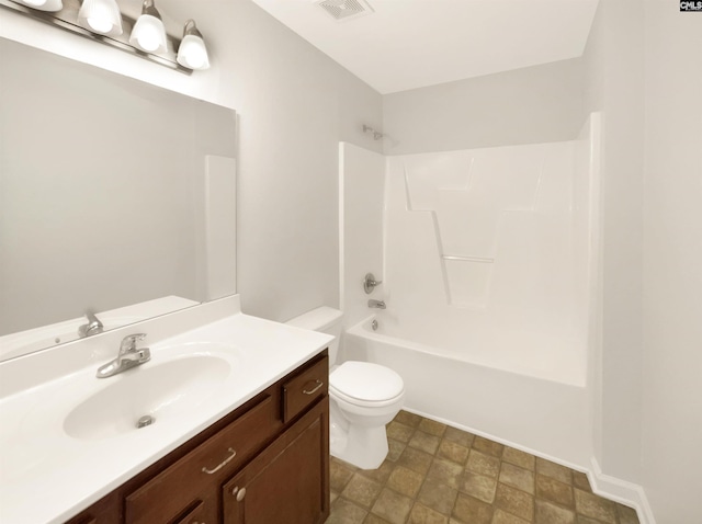 full bathroom featuring vanity, toilet, and shower / bathtub combination