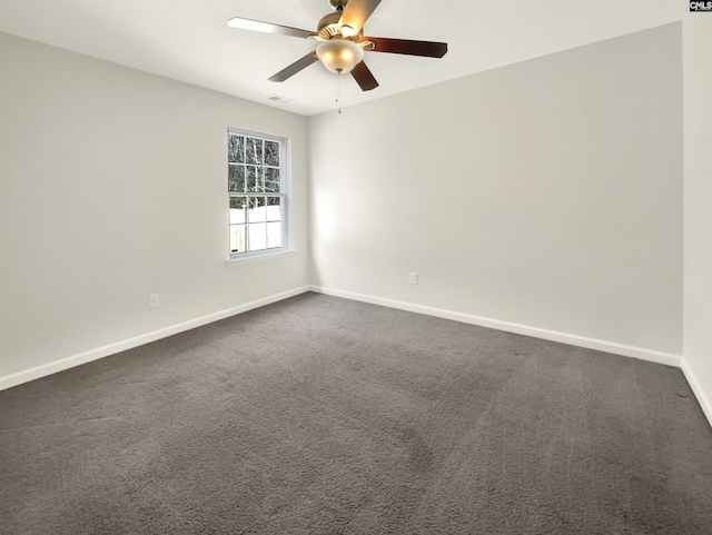 carpeted empty room with ceiling fan