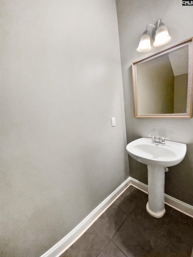 bathroom with tile patterned flooring