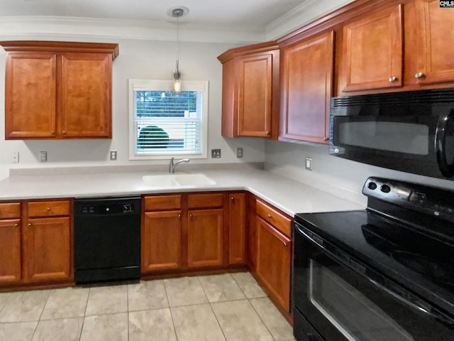 kitchen with black appliances, ornamental molding, sink, and hanging light fixtures