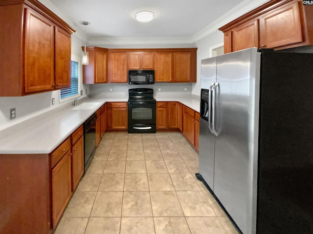 kitchen with black appliances, crown molding, sink, light tile patterned floors, and decorative light fixtures